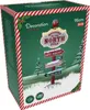 The image shows the packaging of a Christmas decoration, a lighted North Pole signpost with four directional planks. Podgląd zdjęcia produktu
