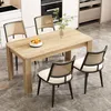 A dining table with four chairs in a modern kitchen setting. Podgląd zdjęcia produktu