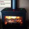A wood-burning stove with markings indicating correct and incorrect placement for a stove fan. Produktbild-Vorschau