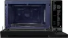 An open microwave oven showing its interior and a control panel with text. Voir les images du produit