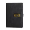 A closed black notebook with a gold combination lock on the front. Náhľad obrázku produktu