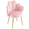 A pink velvet chair with gold legs on a white background. Náhľad obrázku produktu