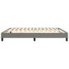A grey upholstered bed frame with wooden slats is shown from the side against a white background. Voir les images du produit