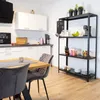 A modern kitchen with a dining table and a shelving unit. Produktbild-Vorschau