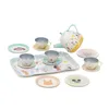 A toy tea set with cups, saucers, plates, and a teapot arranged on a tray and around it. Produktbild-Vorschau