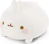 A white plush toy rabbit with brown eyes and pink cheeks, lying on a white surface. Produktbild-Vorschau