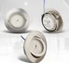 A collage of three images showing a recessed LED spotlight from different angles, with a blurred background suggesting an interior setting. Produktbild-Vorschau