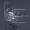 A clear plastic sewing machine bobbin with measurement indicators. Produktbild-Vorschau