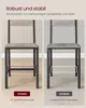 A comparison of two bar stools, one with a reinforcing bar and one without, highlighting stability. Produktbild-Vorschau