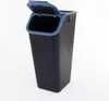 A dark blue trash can with a blue lid that is open, shown against a white background. Produktbild-Vorschau