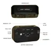 The image shows two views of a black digital alarm clock with labels pointing to various buttons and features. Anteprima dell’immagine prodotto