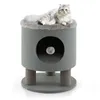 A cat is resting on top of a gray cat tree with a hanging toy inside. Náhľad obrázku produktu