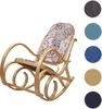 A rocking chair with a floral patterned cushion, shown against a white background. Several color swatches are displayed to the right of the chair. Podgląd zdjęcia produktu