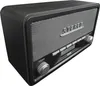 A close-up, angled view of a dark grey DAB radio with a wood-effect casing. Voir les images du produit
