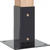 A close-up view of a black metal post base with a wooden post inserted. Produktbild-Vorschau