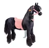 A black mechanical horse toy with a pink saddle and bridle, shown on a white background. Anteprima dell’immagine prodotto