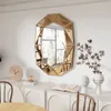 A decorative mirror is displayed on a wall above a white sideboard, with various decorative items placed on the sideboard. Produktbild-Vorschau