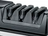 A close-up view of a black electric knife sharpener with three numbered slots. Podgląd zdjęcia produktu