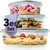A stack of three glass food storage containers filled with different foods. Voir les images du produit