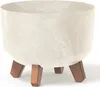 A cream-colored planter with a marbled pattern sits on three brown legs against a white background. Náhled obrázku produktu