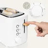 A hand is shown pressing the lever of a white toaster, with two slices of bread inside. A dial with numbers is visible in the background. Anteprima dell’immagine prodotto