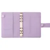 An open purple binder with pockets on the left and a ring binder mechanism in the center. Voir les images du produit