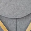 A close-up view of a gray fabric laundry basket with wooden handles. Náhled obrázku produktu