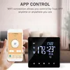 A hand holding a smartphone displaying a thermostat app next to a smart thermostat device. Náhled obrázku produktu