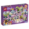 The back of a LEGO Friends Stephanies Sportstadion 41338 playset box, showing various scenes and characters from the set. Podgląd zdjęcia produktu