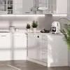 A clean, modern kitchen counter with white cabinets and appliances. Produktbild-Vorschau