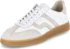 A white and tan sneaker with a brown sole is shown from a side angle against a white background. Produktbild-Vorschau