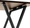 Close-up view of the underside of a table, showing the black metal legs and the brown tabletop. Náhled obrázku produktu