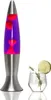 A lava lamp and a cocktail glass are placed on a white background. Produktbild-Vorschau