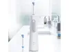 A white Oral-B AquaCare 6 water flosser and an extra nozzle are displayed on a white countertop in a bathroom setting. Náhľad obrázku produktu