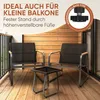 A balcony set with two chairs and a table on a wooden deck. Anteprima dell’immagine prodotto