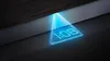 A digital clock projected onto the floor from under a kitchen cabinet. Produktbild-Vorschau