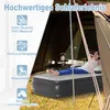A woman relaxing on an inflatable mattress inside a tent. Náhled obrázku produktu
