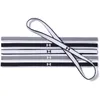 A set of Under Armour headbands laid out horizontally, with one headband draped diagonally over the top. Voir les images du produit