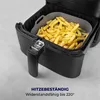 A close-up view of an air fryer basket filled with french fries, with text overlay indicating heat resistance. Náhľad obrázku produktu