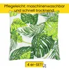 A cushion with a tropical leaf pattern on a white background. Produktbild-Vorschau