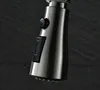 Close-up of a kitchen faucet head with buttons. Náhled obrázku produktu