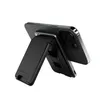 A black phone case with a kickstand attached to the back of a smartphone. Náhled obrázku produktu