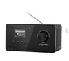 A black digital radio with a screen displaying song information and controls. Produktbild-Vorschau