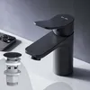 A black faucet and pop-up drain assembly are displayed on a white surface against a gray background. Produktbild-Vorschau