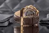 A close-up shot of the back of a Tommy Hilfiger watch with a brown leather strap and gold buckle. Anteprima dell’immagine prodotto