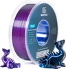 A spool of purple PLA filament for a 3D printer is shown, with two small 3D-printed dragon figurines in front of it. The spool has product information printed on it. Produktbild-Vorschau