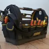 A Stanley FatMax tool bag filled with various tools, placed on a wooden floor. Anteprima dell’immagine prodotto