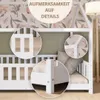 Close-up views of a white wooden bed frame with floral wallpaper in the background. Produktbild-Vorschau