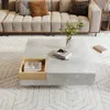 A modern living room scene featuring a couch and a coffee table. Produktbild-Vorschau