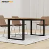 A dining table with chairs in a minimalist setting. Anteprima dell’immagine prodotto